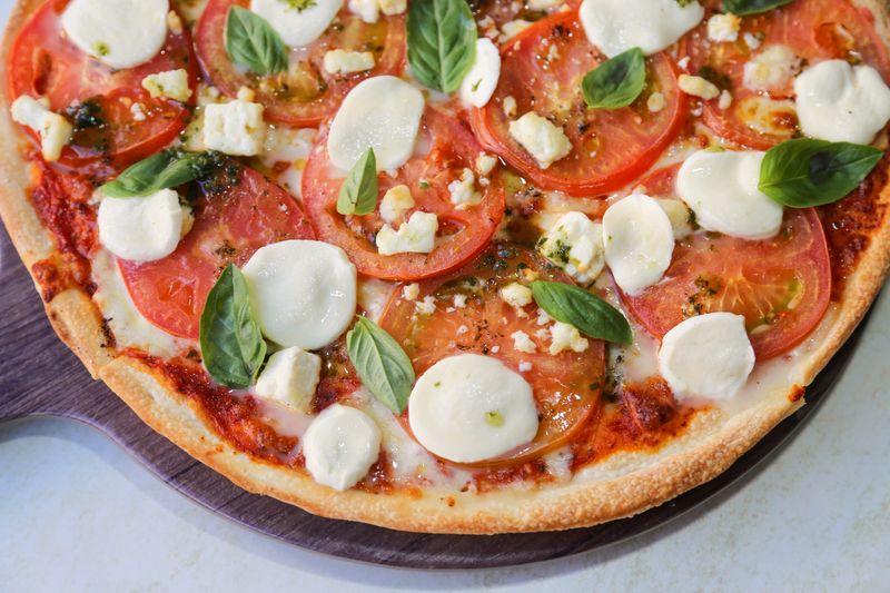 Pizza factory Inferno specialty pizza with spicy toppings