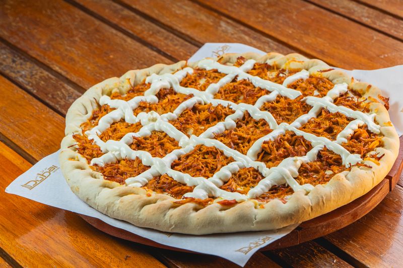 BBQ Smokehouse pizza with grilled chicken and BBQ sauce