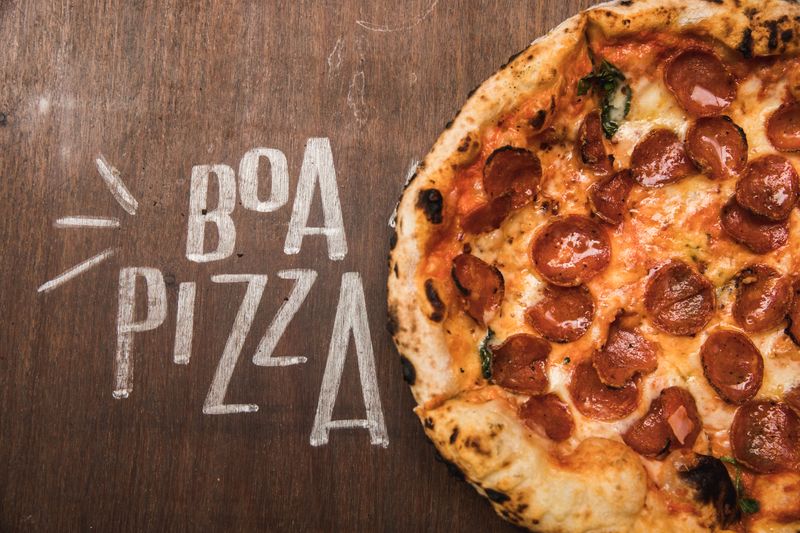 Meat Lovers pizza factory style with pepperoni sausage and ham